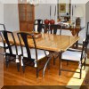 F29. Dining table with metal base (includes leaves) 